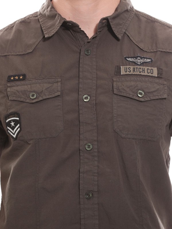 Chemise manches courtes...