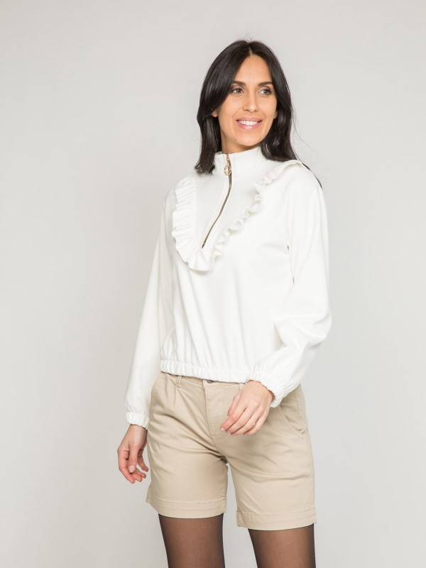 Pull polaire avec volants...