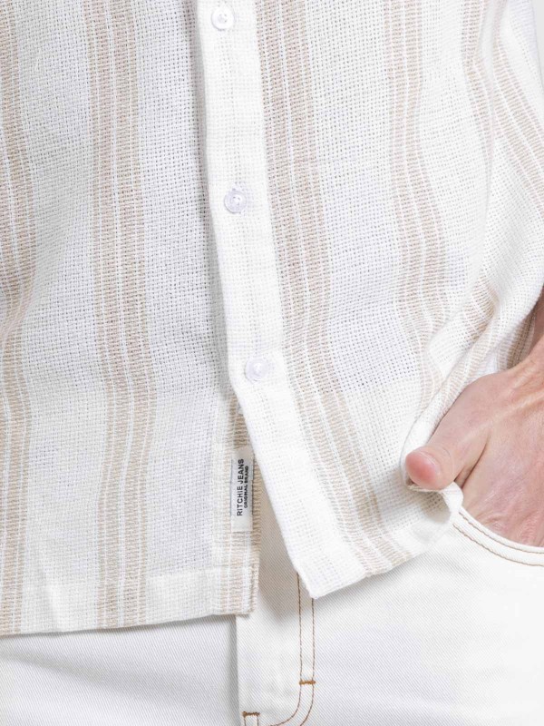 Chemise manches courtes...