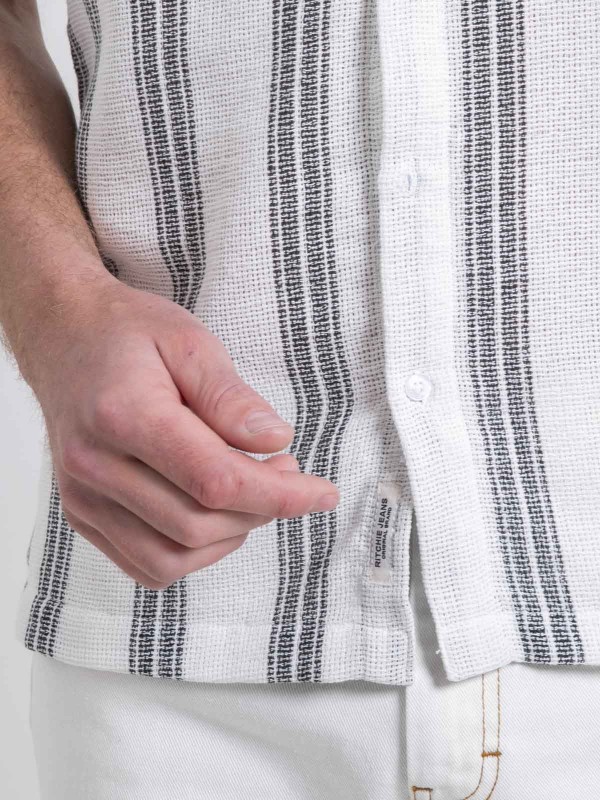 Chemise manches courtes...