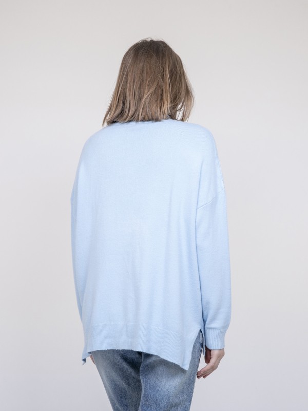 Pull col roulé à sequins...