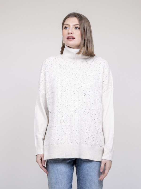 Pull col roulé à sequins...