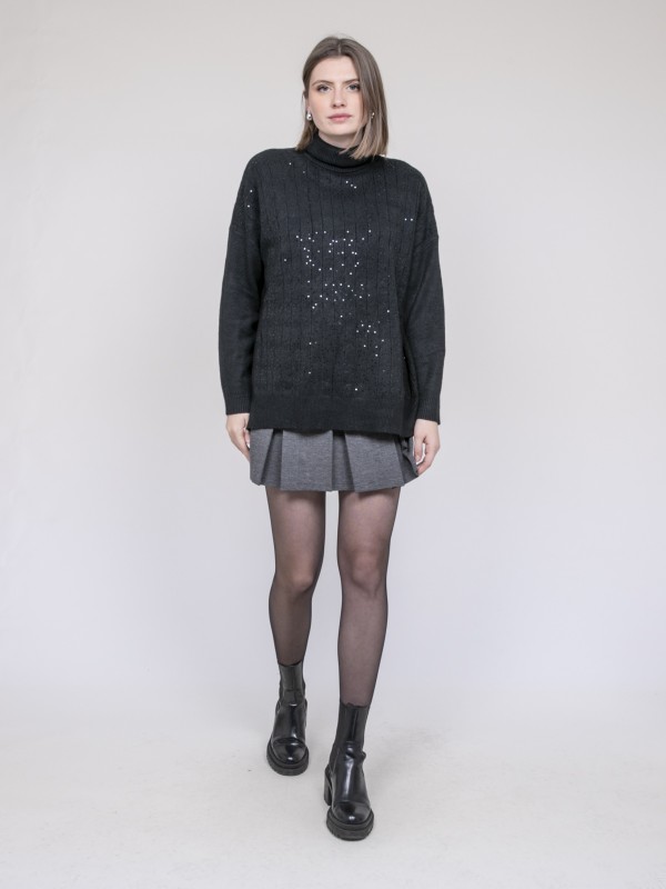 Pull col roulé à sequins...