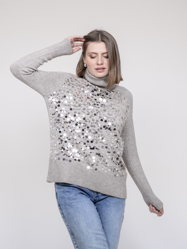 Pull col roulé à sequins...