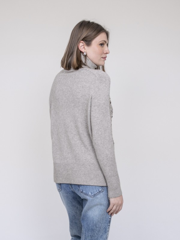 Pull col roulé à sequins...