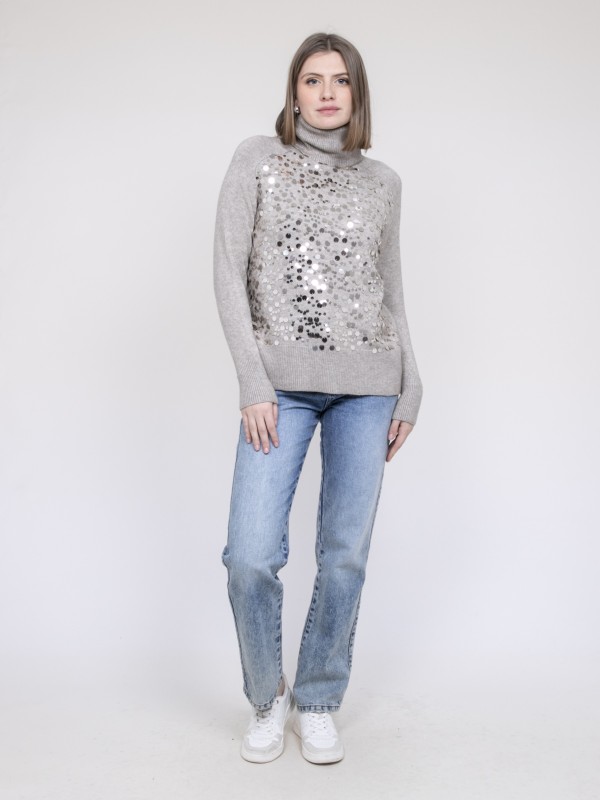 Pull col roulé à sequins...