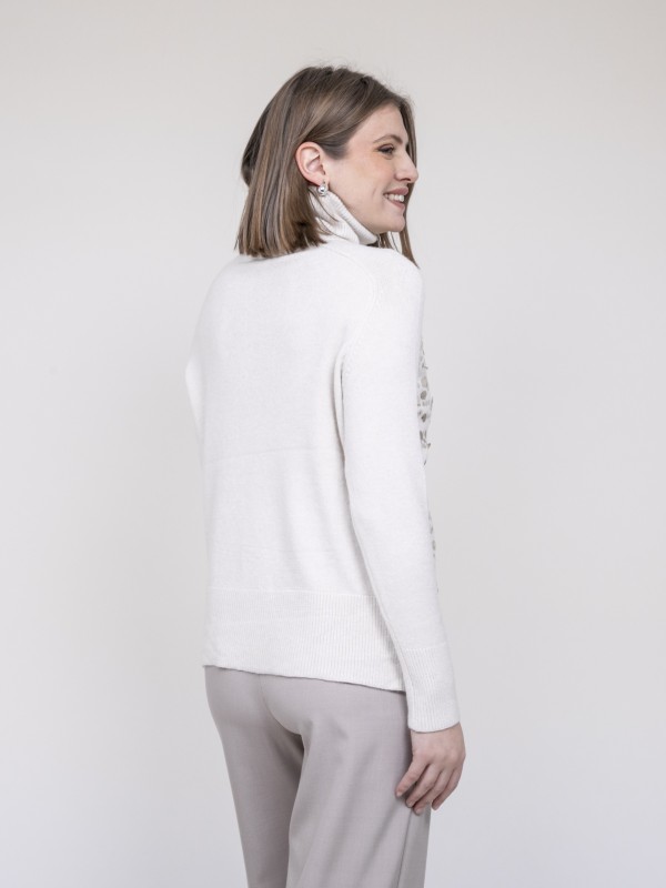 Pull col roulé à sequins...