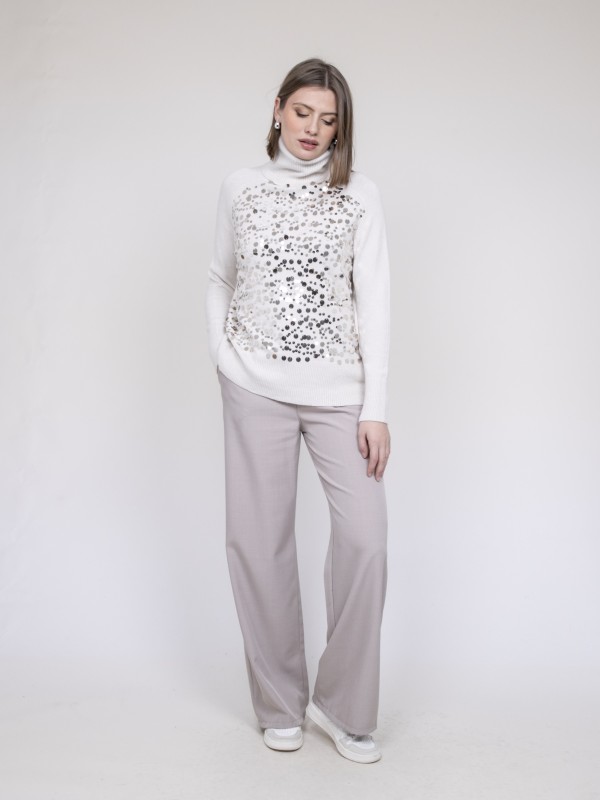 Pull col roulé à sequins...