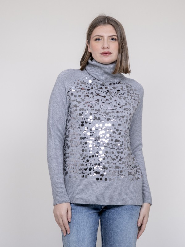 Pull col roulé à sequins...
