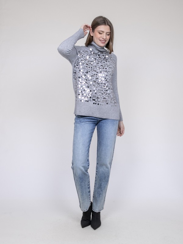 Pull col roulé à sequins...