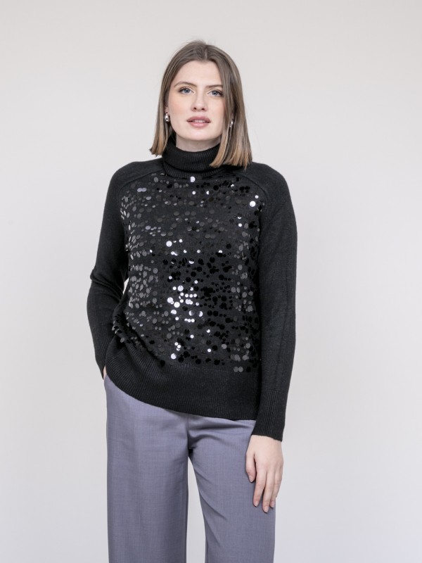 Pull col roulé à sequins...