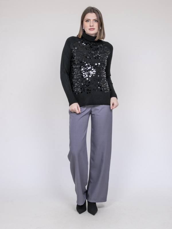 Pull col roulé à sequins...