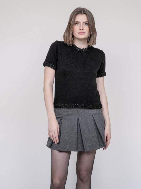 Pull details tressés...