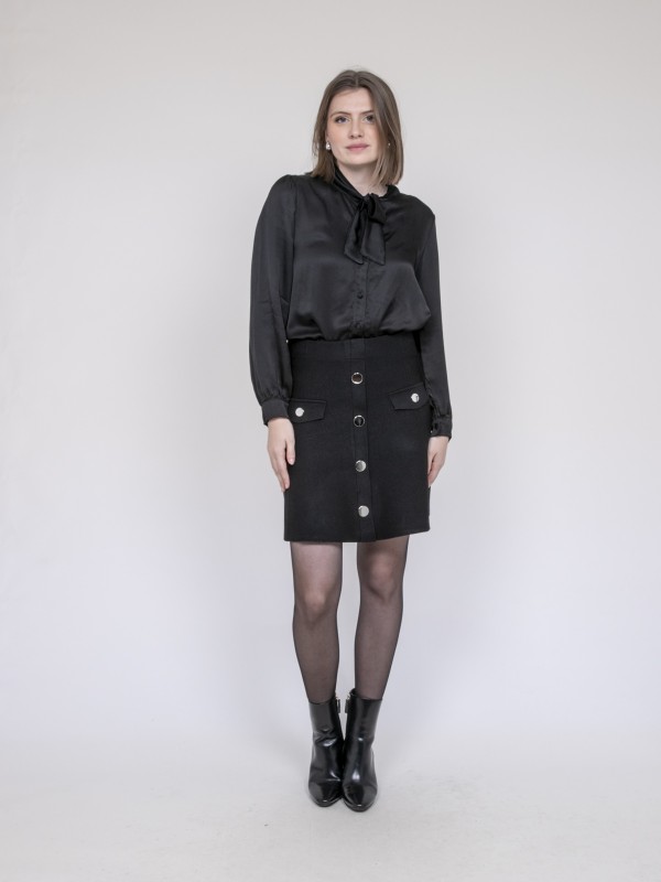 Jupe en maille boutons...