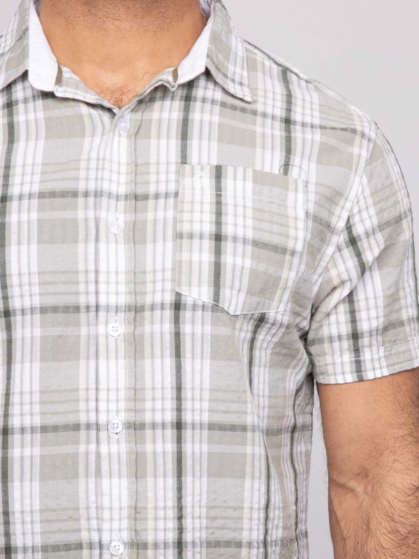 Chemise manches courtes...