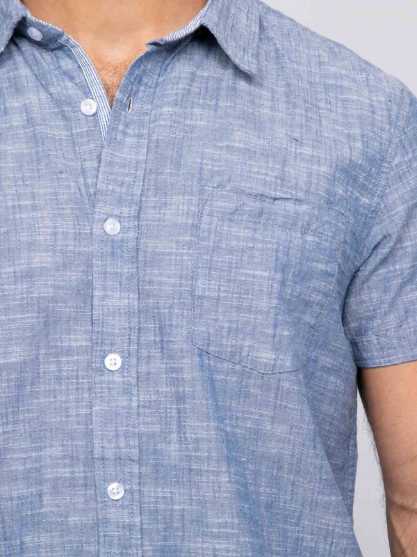 Chemise manches courtes...