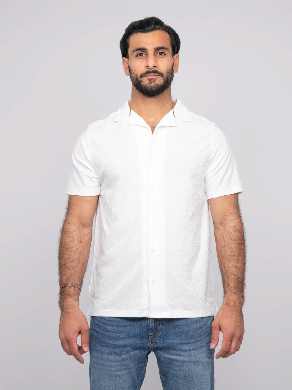 Chemise manches courtes...