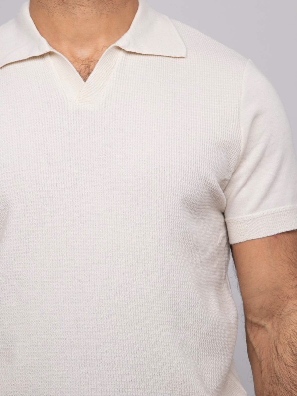 Pull polo manches courtes...