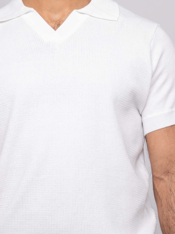 Pull polo manches courtes...