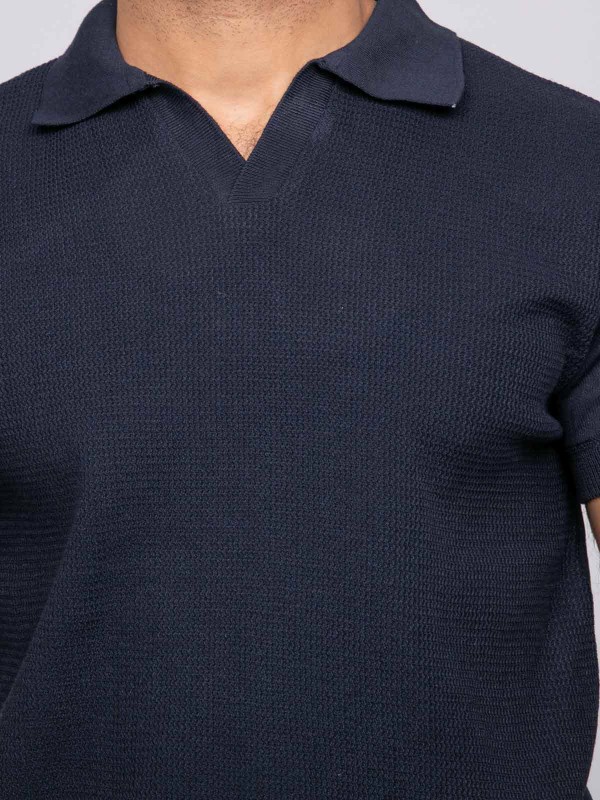 Pull polo manches courtes...