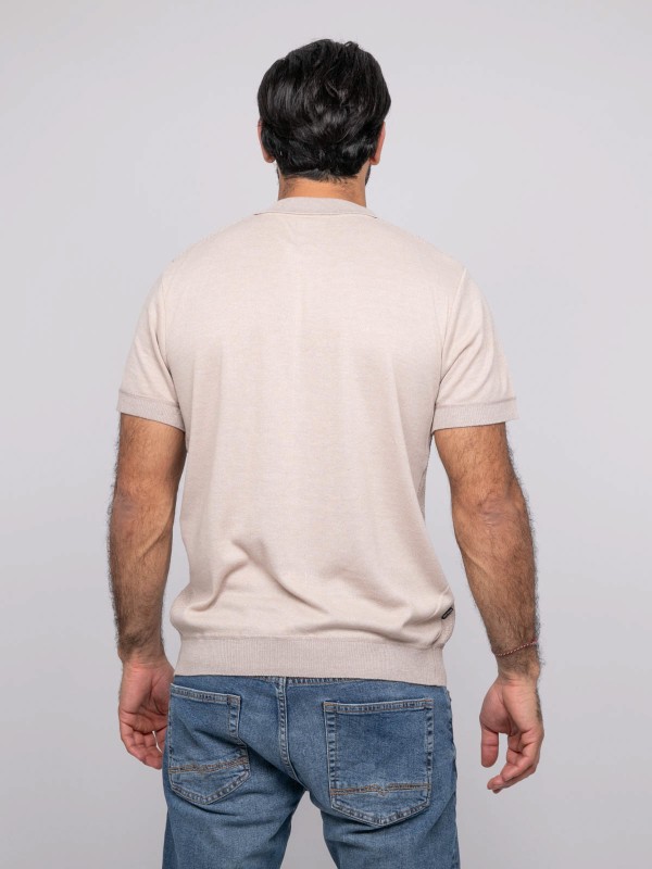 Pull polo manche courtes...