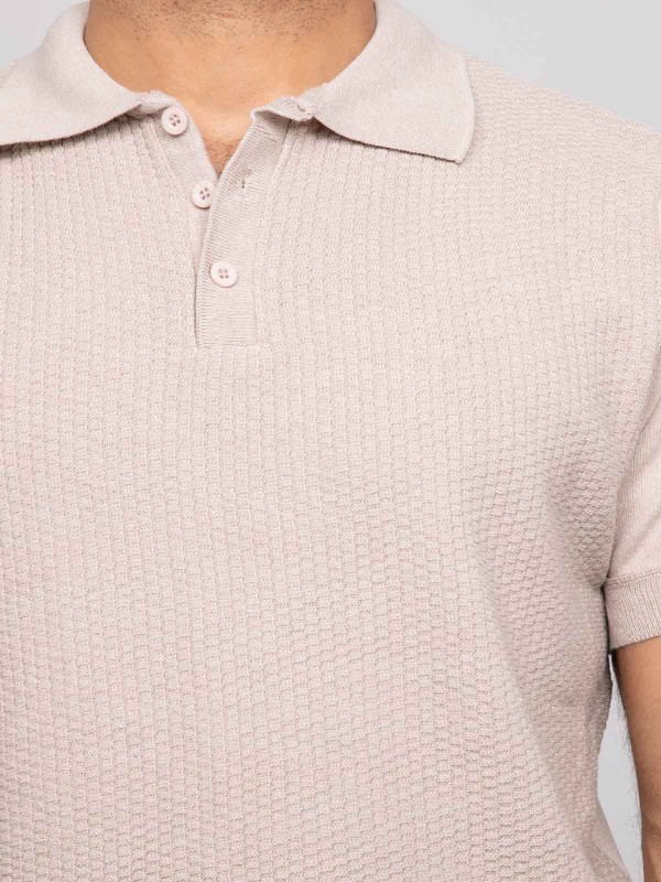 Pull polo manche courtes...