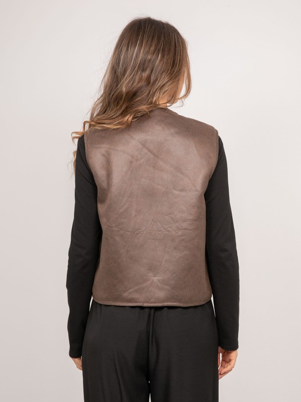 Gilet sans manches...