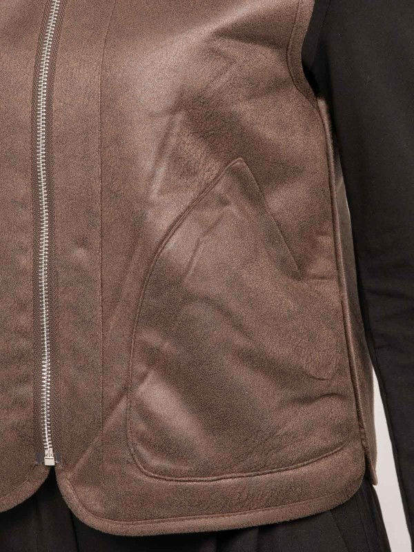 Gilet sans manches...