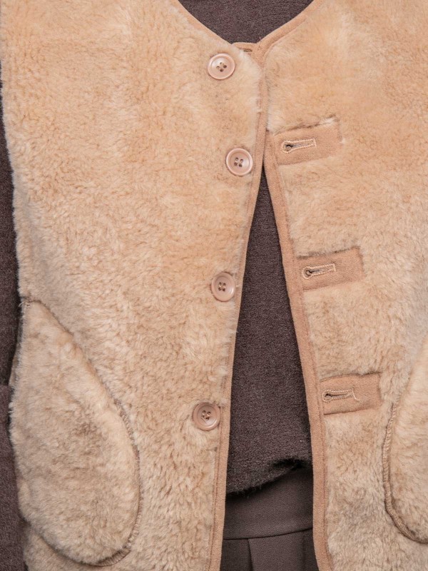 Gilet sans manches...
