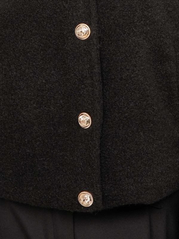 Veste courte effet laine...